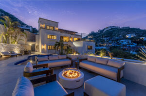 Cabo Luxury Pedregal Csl Casa LA PIÑATA A luxury villa located in the exclusive Pedregal Cabo San Lucas. Perfect as a private residence or a high-end vacation rental, this villa offers an exceptional combination of comfort, style, privacy, and location.The villa features 8 bedrooms including a service room (as an independent apartment suite), 8.5 bathrooms, and 13 beds.Fully furnished and equipped with top-quality finishes, providing a turnkey experience.Every detail has been thoughtfully crafted to create an exceptional space for family gatherings and entertaining. The expansive terrace includes a great swimming pool, 2 jacuzzi, bar, 2 BBQ station, 2 fire pits, and multiple lounge areas, to enjoy the very best of Cabo living The interiors feature cozy and elegant living spaces, including a inside bar, games room, media room and impeccable design in every corner Fully furnished and equipped, representing an outstanding opportunity. With its exceptional design, amenities, and location, this villa embodies the best of the Baja lifestyle – 125 Camino del Mar, Cabo San Lucas, BS