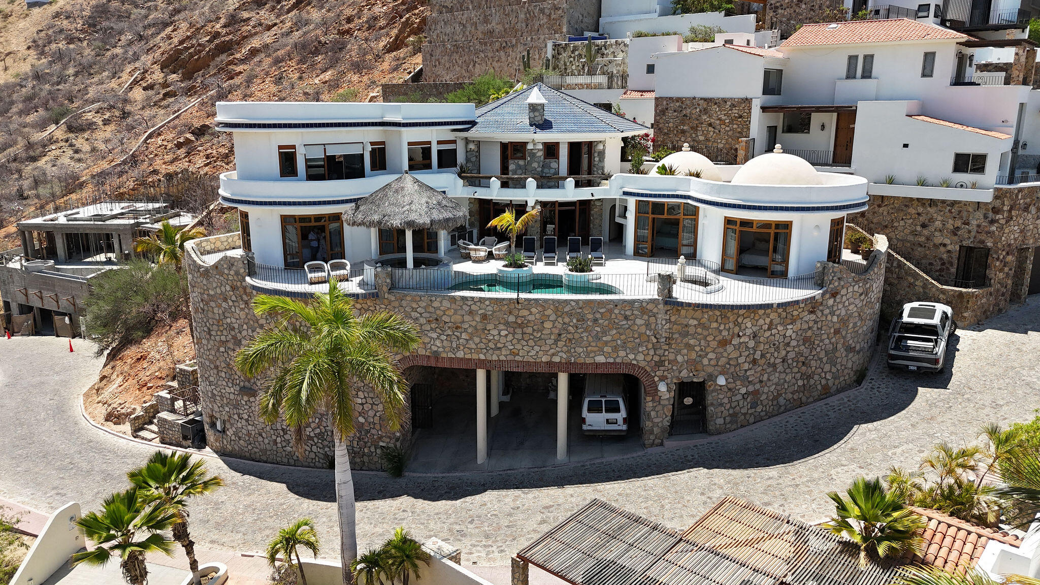 Cabo Luxury Pedregal Csl Casa Agave presents a rare invitation to experience the raw beauty and vibrant life of the Pacific Ocean from a residence of contemporary distinction. Designed for those who seek both serene sanctuary and moments of shared delight, this seven-bedroom oceanfront home offers an unparalleled connection to the stunning Los Cabos coast.Imagine waking to the sound of waves, the horizon a canvas for breathtaking sunrises. At Casa Agave, the expansive living spaces seamlessly merge with the coastal landscape, offering uninterrupted for sale