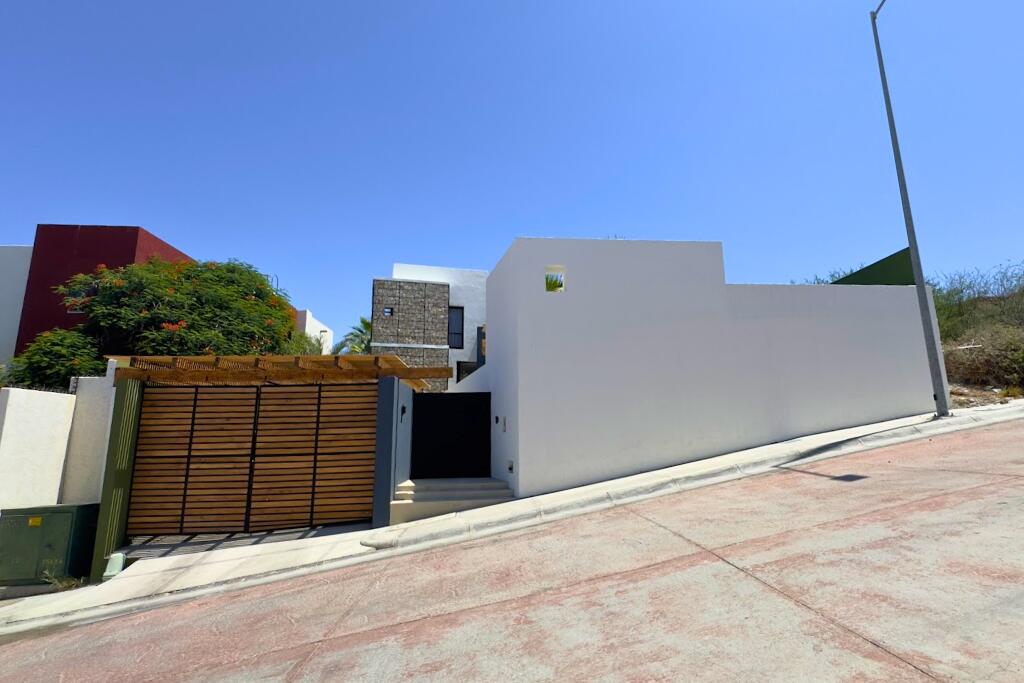 Cabo Luxury El Tezal-Oceanside:General Located along the highly sought-after Cabo Corridor, this charming 2-bedroom, 2-bathroom open-concept home is set within a lush, private garden oasis filled with mature tropical landscaping. The seamless indoor-outdoor layout flows effortlessly into a stunning lagoon-style pool, creating a peaceful, resort-like setting ideal for relaxing or entertaining.With its expansive grounds and prime location on the corridor just minutes from downtown Cabo San Lucas, the property offers incredible flexibility. Whether envisioned as a private residence, boutique event space and hotel, or future condo development, this is a rare opportunity to own a versatile property in one of Cabo's fastest-growing areas. for sale