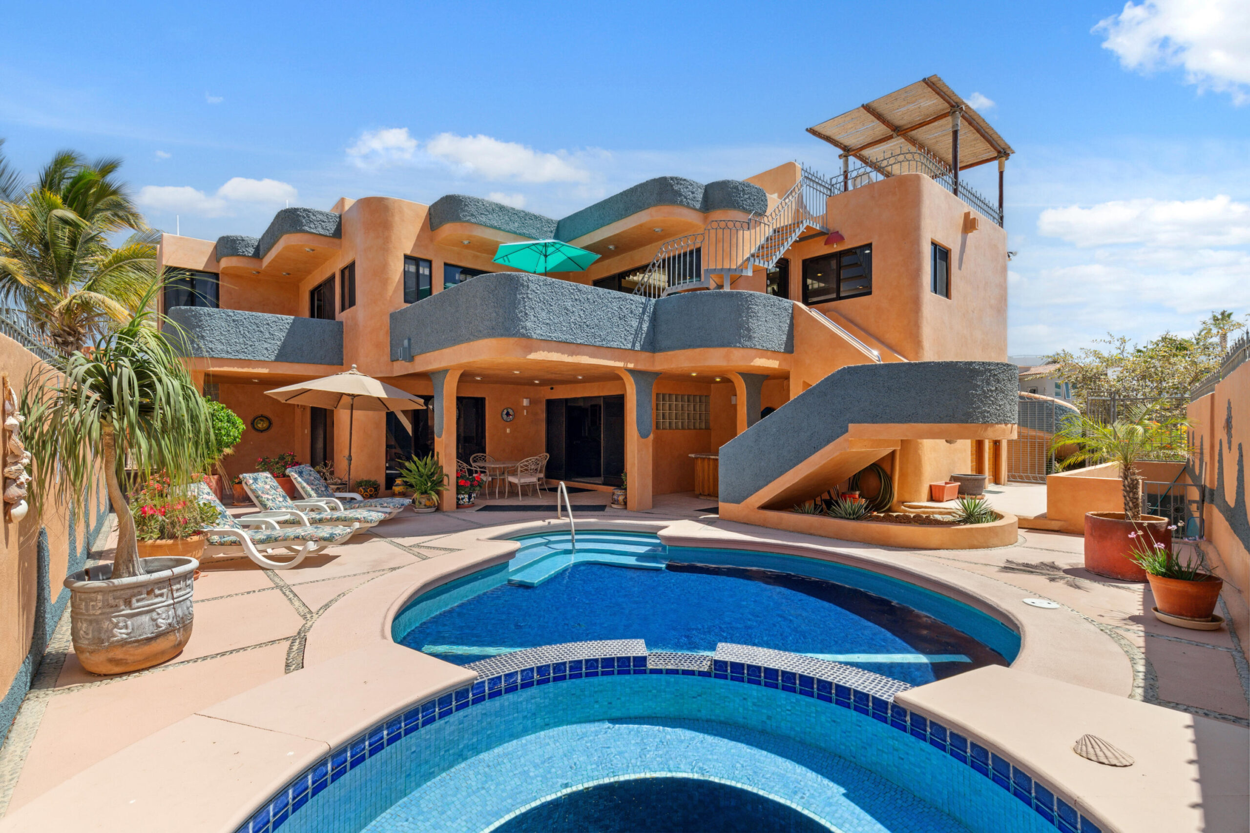 Cabo Luxury Cabo Bello Casa Blue Fin is a rare DUPLEX investment opportunity in the desirable oceanside community of Cabo Bello. This versatile 4-bedroom, 4-bathroom home offers incredible potential for rental income, full-time or multi-generational living, or both. Each level features 2-bedrooms and 2-bathrooms with private entrances in front and back, making it ideal for generating revenue while maintaining personal privacy or hosting extended family and guests.Enjoy beautiful for sale