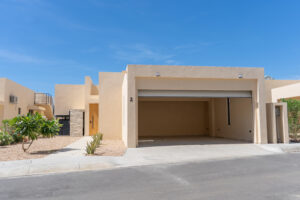 Cabo Luxury Toscana Residences Turnkey three-bedroom home in the well-kept, gated community of Toscana in El Tezal, minutes from downtown Cabo San Lucas and Medano Beach. Inspired by Mediterranean architecture and the Italian coast, Toscana features beautifully maintained desert landscaping with vibrant bougainvillea and colorful common areas. This fully furnished residence offers a main-floor primary suite, spacious guest bedrooms, and an open-concept kitchen with granite countertops and stainless appliances that flows to a private terrace. The rooftop showcases ocean and Arch – 357 Calle Crispen Cesena, Cabo Corridor, BS