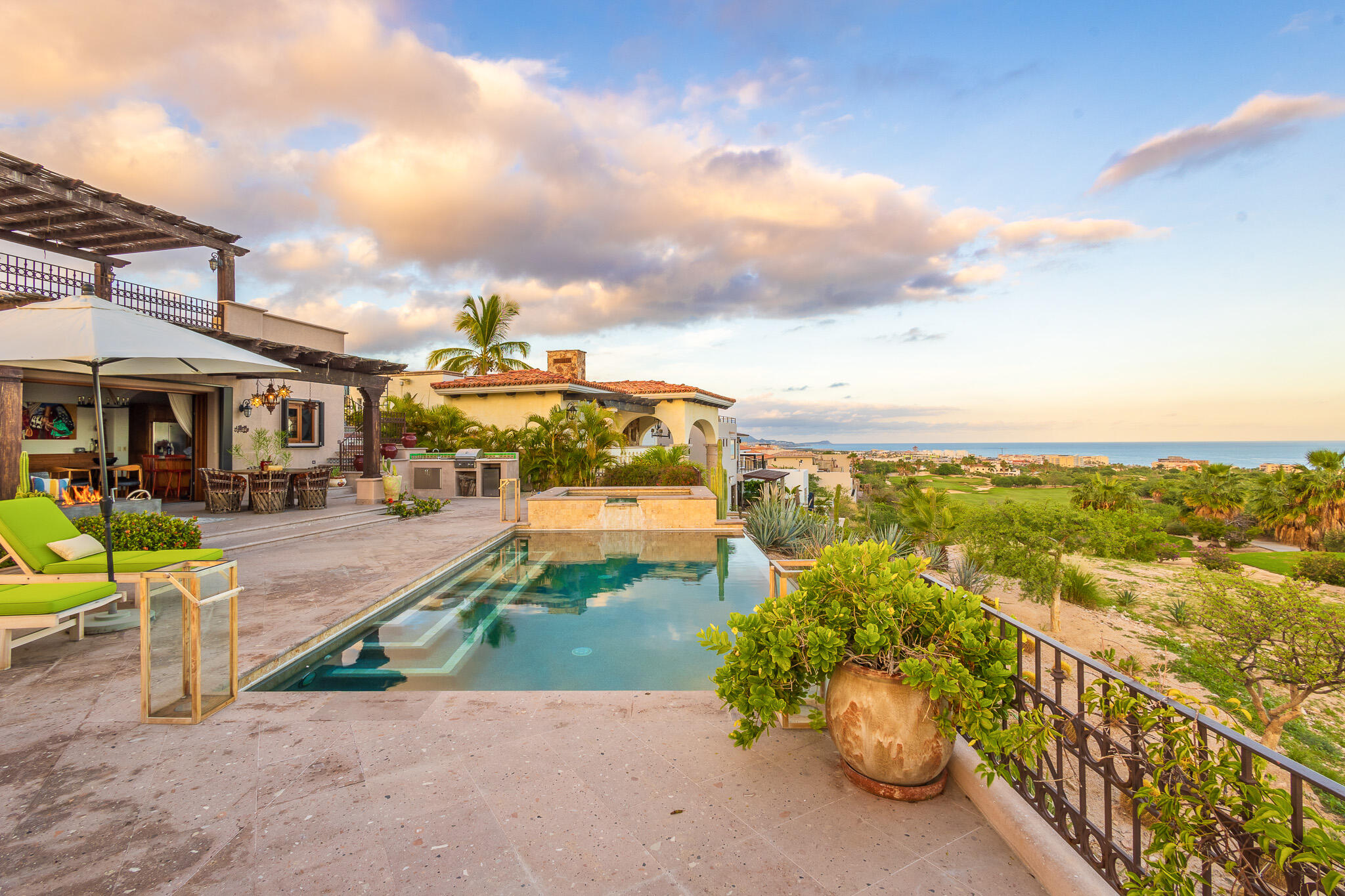 Cabo Luxury Cabo Colorado Discover modern luxury in this exquisitely designed home, built in 2020 and nestled within the exclusive, beachfront, private gated community of Cabo Colorado in San José del Cabo—just 2 miles from Palmilla Beach. Enjoy the convenience of living just steps from a stunning, sandy private beach within the community.With a striking contemporary aesthetic, this residence features gleaming white marble floors, beautifully appointed marble bathrooms, and captivating ocean for sale