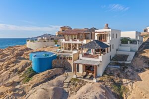 Cabo Luxury Cove Club Casa SerenaAn architectural marvel that seamlessly blends the wonder of the Baja with the beauty and serenity of the Mar de Cortez. Thoughtful sight lines frame beautiful vistas from every room making the home feel like you're living in a resort and private estate at the same time. Designed as a retreat for family and friends by one of the most recognized and renowned architects in Mexico, Jacinto Avalos, Casa Serena blends the attention to detail and fine Mexican craftsmanship appropriately honoring its iconic location. Maintained with an open check book and live in staff, this ocean front masterpiece is now ready for the next fortunate family to make memories and leave their own legacy at Casa Serena. – 75 Avenue de Marlin, Pacific, BS