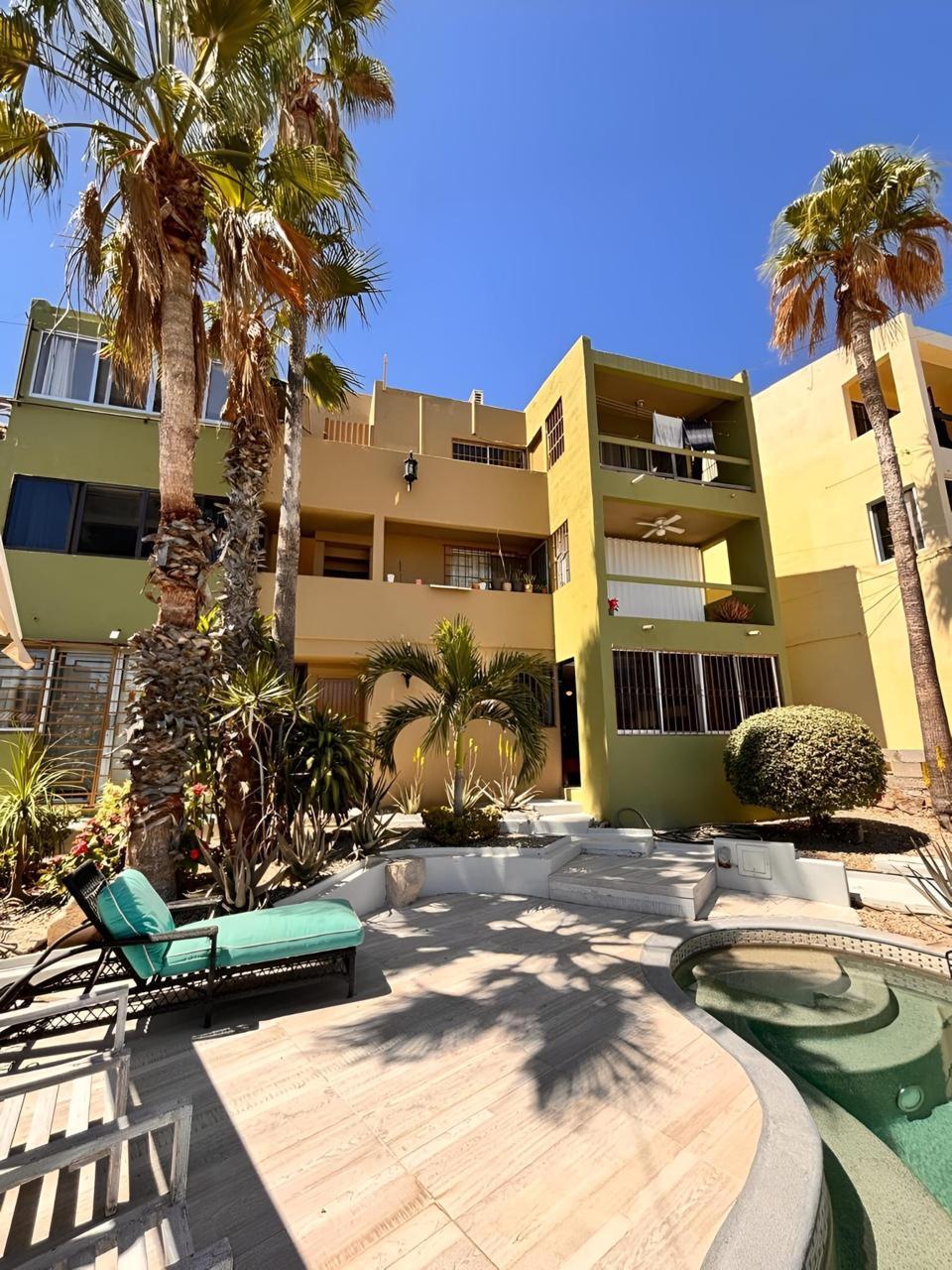 Cabo Luxury Bahia Del Tezal Located in the desirable ocean side area of Cabo San Lucas, within Bahía del Tezal, this bright and well-maintained 2-bedroom, 2-bathroom condo offers one of the best value opportunities in Cabo. The unit features a functional open layout with great natural light, a clean and inviting living space, and move-in ready condition. Ideal for full-time living, a vacation getaway, or a rental investment. Just minutes to Medano Beach and close to shopping, dining, and grocery stores. A great opportunity for savvy buyers seeking rental income potential and strong value. The building offers a rooftop common area with pool, lounge area, and ocean, city, and mountain for sale