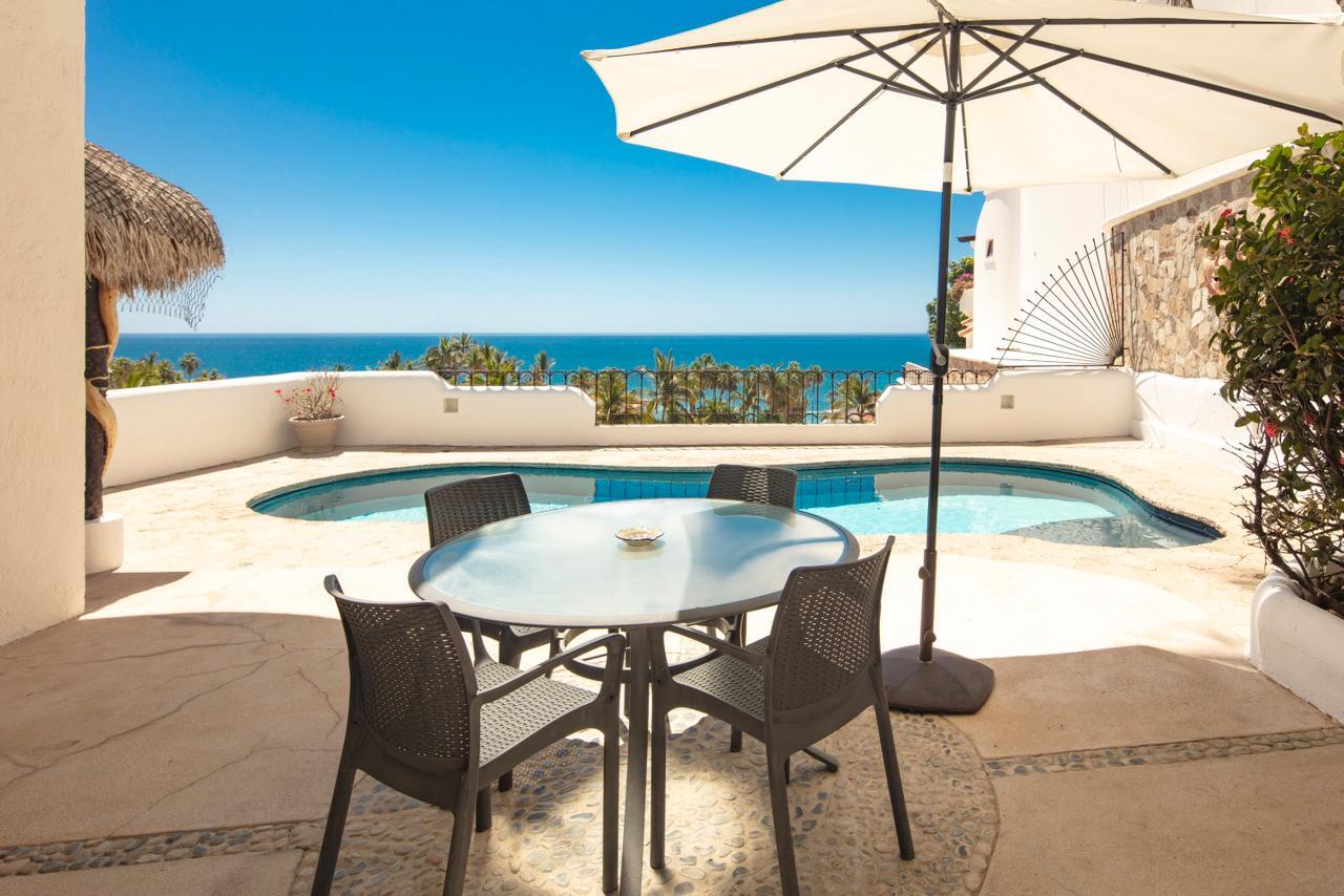 Cabo Luxury Cresta Del Mar Mediterranean-style Home with a poolside bar and generously proportioned patio with its water features, putting green, pool and spa create a playful inviting atmosphere where friends and family will want to gather. Sunset cocktails atop the rooftop deck with its arch for sale