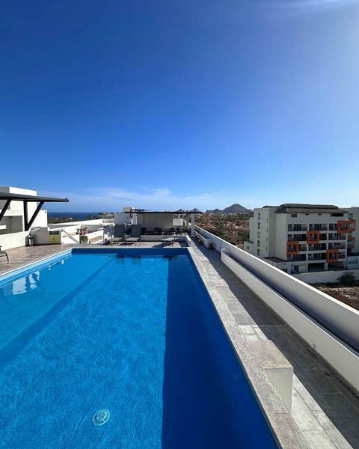 Cabo Luxury Vista Vela Sunset Penthouse fully furnished and turnkey, located in VistaVela Sunset. This PH features spacious interiors, an open-concept living and dining area, and a fully equipped kitchen with appliances included. The unit comes completely furnished, ready to move in or start generating rental income immediately.The highlight of the property is its oversized private rooftop terrace, offering ample space to design and create any concept you envision -- from a lounge area, outdoor kitchen, jacuzzi, or entertainment space. Ideal for those looking to customize their outdoor living experience and maximize the Cabo lifestyle.Amenities:6 swimming poolsFully equipped fitness centerClubhousePadel and pickleball courtsLandscaped gardens and green areasPutting green24/7 gated security for sale