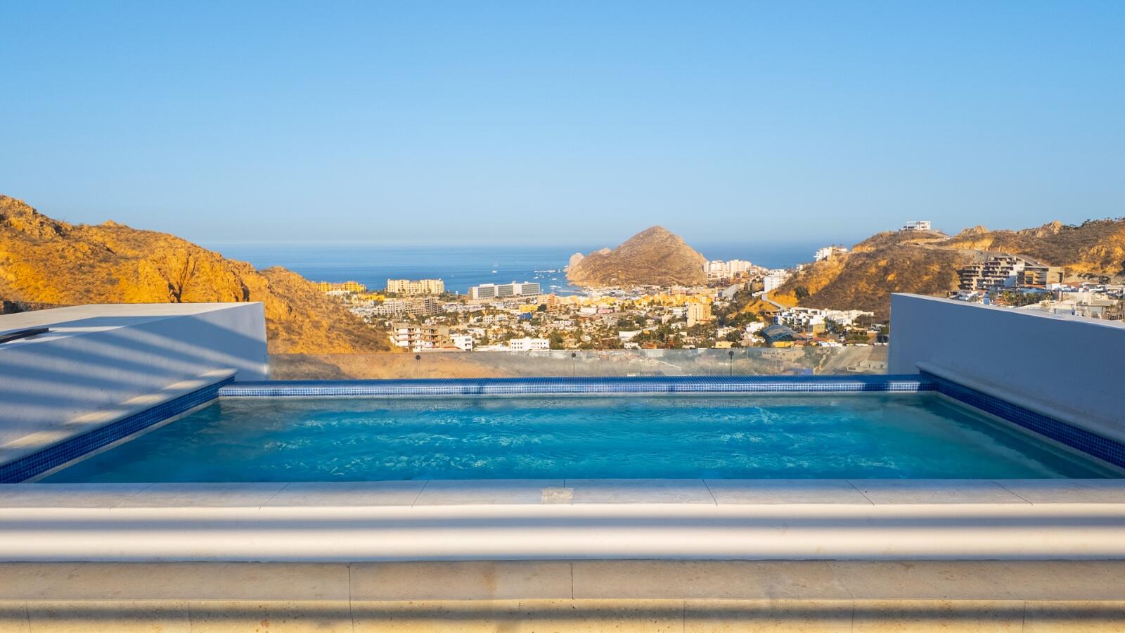 Cabo Luxury Breeze Of Cabo Discover this modern 2-bedroom, 2-bathroom condo located in the highly sought-after Sunset area of Cabo San Lucas. This corner unit offers maximum privacy with only one neighbor and features spacious windows and a cozy terrace where you can enjoy breathtaking sunrises and sunsets. The property includes underground parking, access to a shared rooftop with a swimming pool and panoramic ocean for sale