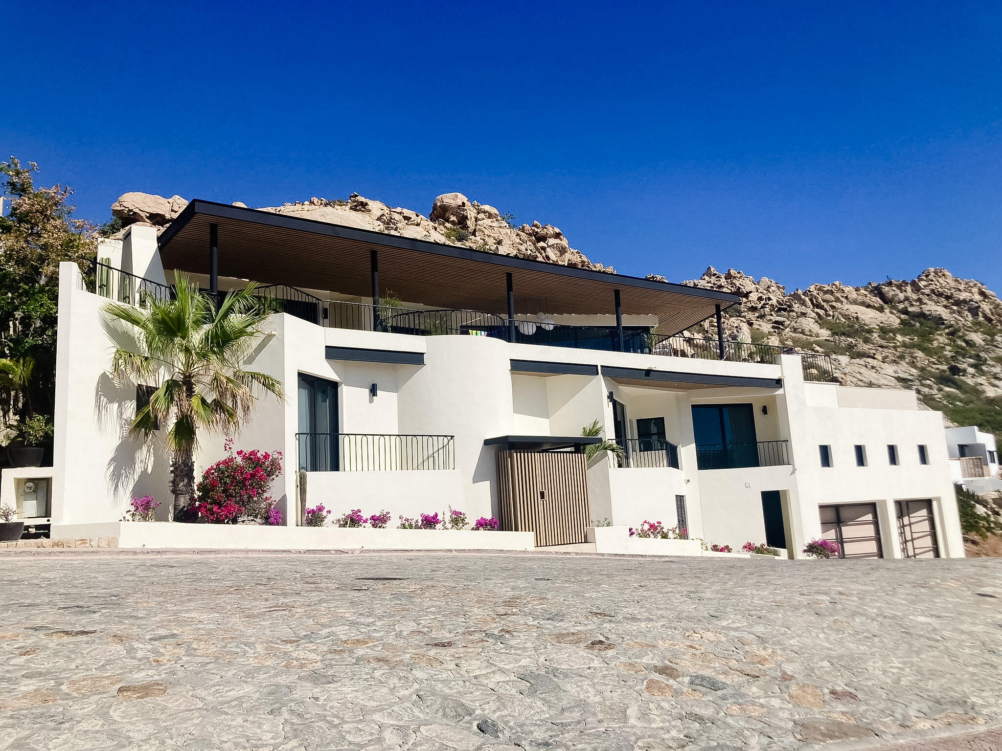 Cabo Luxury Pedregal Csl Casa Agave presents a rare invitation to experience the raw beauty and vibrant life of the Pacific Ocean from a residence of contemporary distinction. Designed for those who seek both serene sanctuary and moments of shared delight, this seven-bedroom oceanfront home offers an unparalleled connection to the stunning Los Cabos coast.Imagine waking to the sound of waves, the horizon a canvas for breathtaking sunrises. At Casa Agave, the expansive living spaces seamlessly merge with the coastal landscape, offering uninterrupted for sale