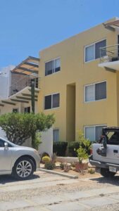 Cabo Luxury Breeze Of Cabo Discover this modern 2-bedroom, 2-bathroom condo located in the highly sought-after Sunset area of Cabo San Lucas. This corner unit offers maximum privacy with only one neighbor and features spacious windows and a cozy terrace where you can enjoy breathtaking sunrises and sunsets. The property includes underground parking, access to a shared rooftop with a swimming pool and panoramic ocean – D6 Cerro, San Jose Corridor, BS