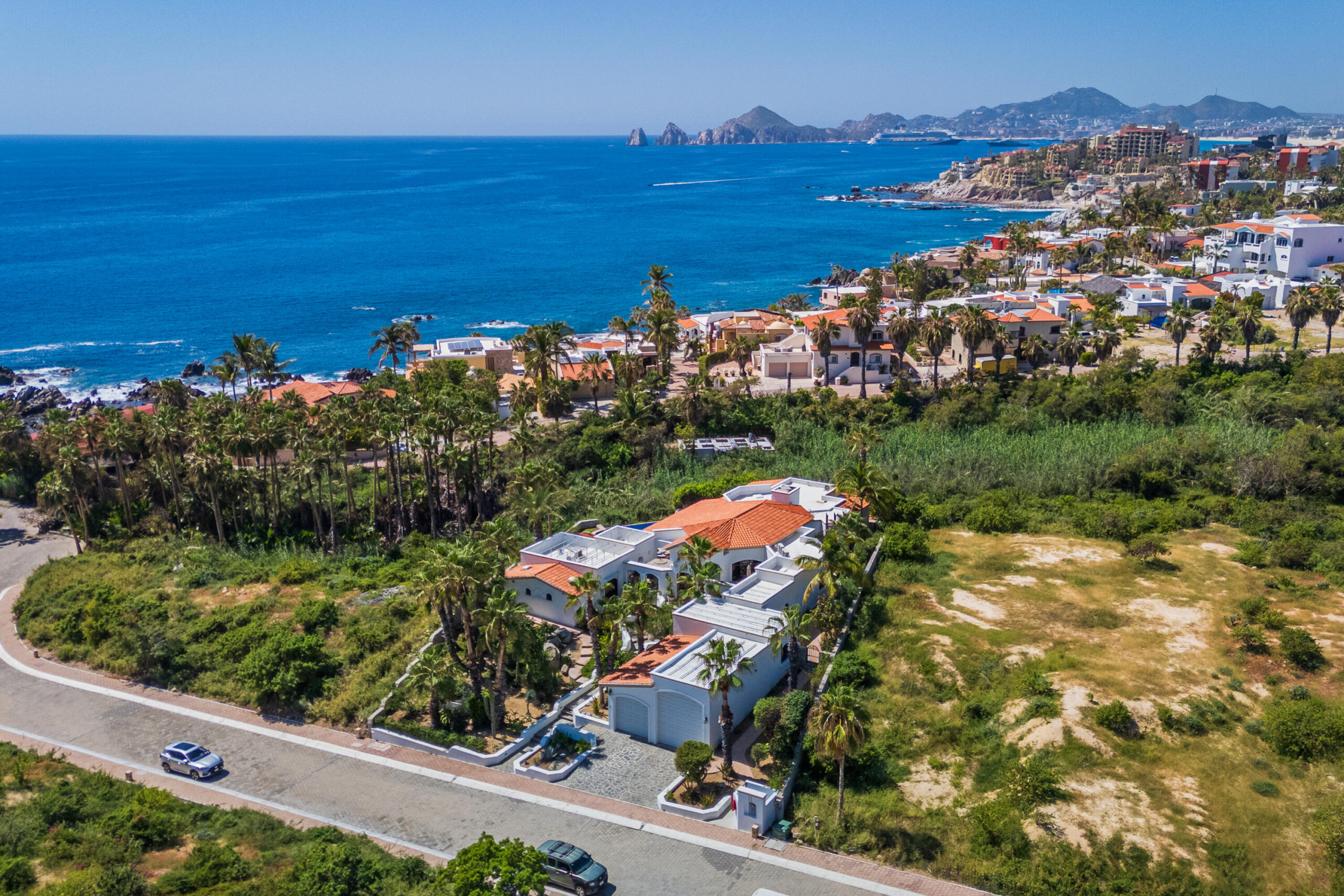 Cabo Luxury Cabo Colorado Discover modern luxury in this exquisitely designed home, built in 2020 and nestled within the exclusive, beachfront, private gated community of Cabo Colorado in San José del Cabo—just 2 miles from Palmilla Beach. Enjoy the convenience of living just steps from a stunning, sandy private beach within the community.With a striking contemporary aesthetic, this residence features gleaming white marble floors, beautifully appointed marble bathrooms, and captivating ocean for sale