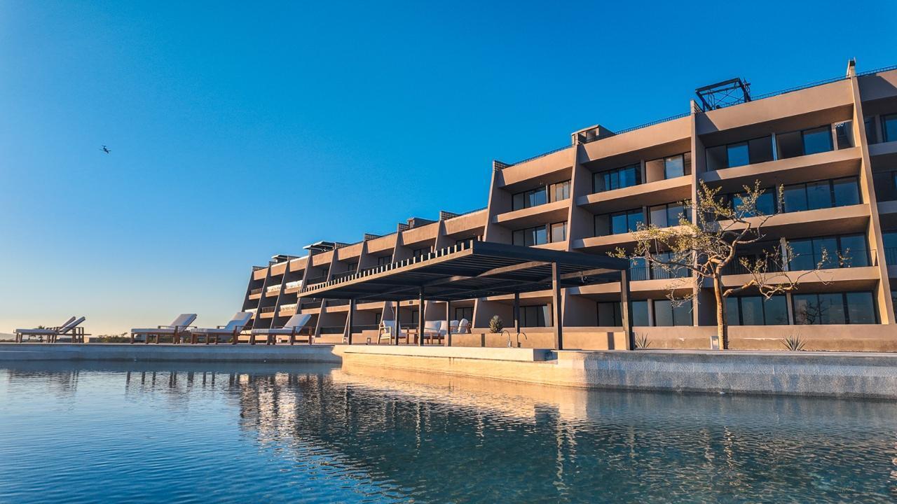 Cabo Luxury Bahia Del Tezal Located in the desirable ocean side area of Cabo San Lucas, within Bahía del Tezal, this bright and well-maintained 2-bedroom, 2-bathroom condo offers one of the best value opportunities in Cabo. The unit features a functional open layout with great natural light, a clean and inviting living space, and move-in ready condition. Ideal for full-time living, a vacation getaway, or a rental investment. Just minutes to Medano Beach and close to shopping, dining, and grocery stores. A great opportunity for savvy buyers seeking rental income potential and strong value. The building offers a rooftop common area with pool, lounge area, and ocean, city, and mountain for sale