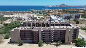 Cabo Luxury Las Arenas Best priced, 2 bed fully furnished condo in Las Arenas!! This property is ideally located just five minutes from the famous Medano Beach and offers convenient access to a wide selection of restaurants, supermarkets, and the Marina.The building features an impressive suite of amenities designed for comfort and relaxation, including two large swimming pools (one is semi-olympic size), firepit, large jacuzzi, and spacious lounging areas. Residents also have access to an on-site spa with a sauna and a fully equipped gym. – Las Arenas, Cabo Corridor, Cabo Corridor, BS