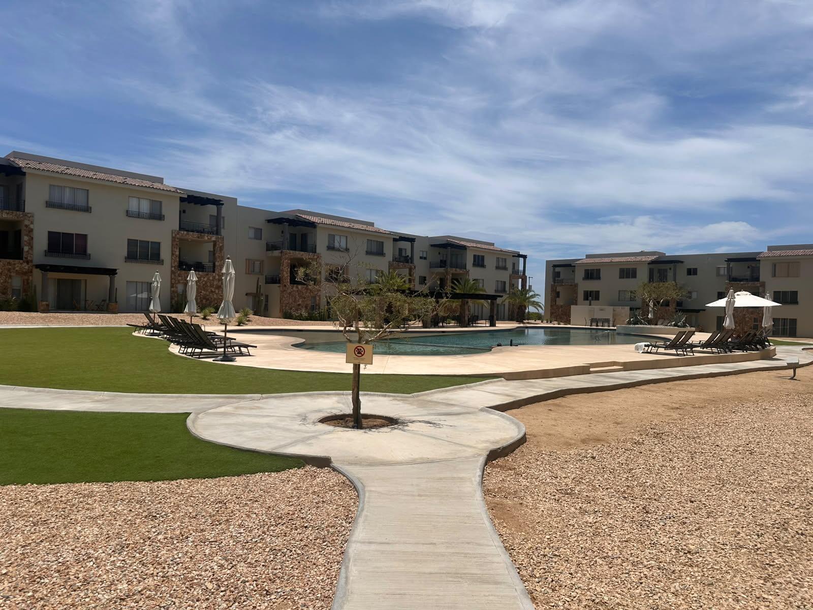 Cabo Luxury Camino Del Mar Ground-Floor Condo | La Joya at Camino del Mar, El TezalDiscover the perfect blend of comfort, convenience, and investment potential in this beautiful ground-floor condominium located in the highly sought-after La Joya Residences, within the master-planned community of Camino del Mar in El Tezal, one of Los Cabos' fastest-growing and highest-appreciating neighborhoods.This thoughtfully designed residence features:* 2 spaci ous bedrooms* 2 full bathrooms* TV / Family Room* Ground-floor location with direct access to the pool* Swimming pool right in front of your terraceResidents also enjoy exclusive resort-style amenities, including:✔️ Semi-Olympic swimming pool✔️ Fully equipped fitness center✔️ Kids' Park✔ – Maldivas, Cabo Corridor, BS