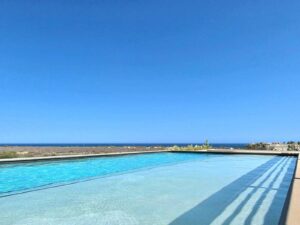 Cabo Luxury Amaterra Corner unit- Amaterra 304 D - is ideally located just 350 meters from Medano Beach, within the Amaterra Phase 2 building. This condo features 2 bedrooms and 2 full bathrooms, and is offered fully furnished and equipped, with one assigned parking space. It's a great option whether you're looking for a comfortable place to live or a property with rental potential.Residents enjoy access to a shared rooftop with a pool and beautiful – sn sn, Cabo Corridor, BS