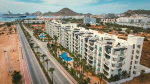 Cabo Luxury Puerta Cabos Village LOCATION, LOCATION, LOCATION!This beautifully appointed 2-bedroom, 2-bathroom condo is located just one block from Medano Beach, Cabo San Lucas' most iconic beach, well-known for its long stretch of golden sand and crystal-clear, swimmable waters.Offered fully furnished and move-in ready, the residence features an open-concept living area that flows seamlessly onto a spacious private terrace--perfect for relaxing or entertaining. Whether you're looking for a vacation home or an income-producing investment, this property is ready to enjoy from day one.The generous primary suite boasts an oversized en-suite bathroom complete with a luxurious Jacuzzi tub, creating the perfect private retreat.Additional features include one underground parking space and a private storage room. Residents enjoy exceptional community amenities, including 24-hour security and two large swimming pools. Ideally located just minutes from the Cabo San Lucas Marina, downtown, world-class dining, shopping, and vibrant nightlife, this condo offers the perfect combination of convenience, lifestyle, and investment potential. – 3757 Blvd. Constituyentes, Cabo San Lucas, BS