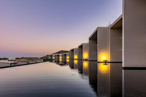 Cabo Luxury Cora SUNSET A 101- the crown jewel of the entire development. A rare 6-bedroom, 5.2-bath residence spanning two full living levels: the main floor plus a private underground bunker suite with its own living room, dining room, kitchen, bedrooms and baths -- ideal for multigenerational living or an income-producing guest retreat. Enjoy a private pool, jacuzzi, fire pit and BBQ area under an extended pergola, plus an extended terrace beside a tranquil espejo de agua. Ocean – SUNSET PASEO DEL MONTE CLUB CAMPESTRE, San Jose del Cabo, BS